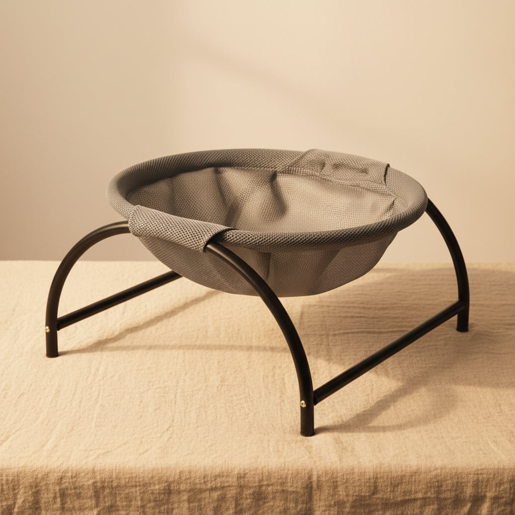 Gray mesh chair with black metal frame on a white background